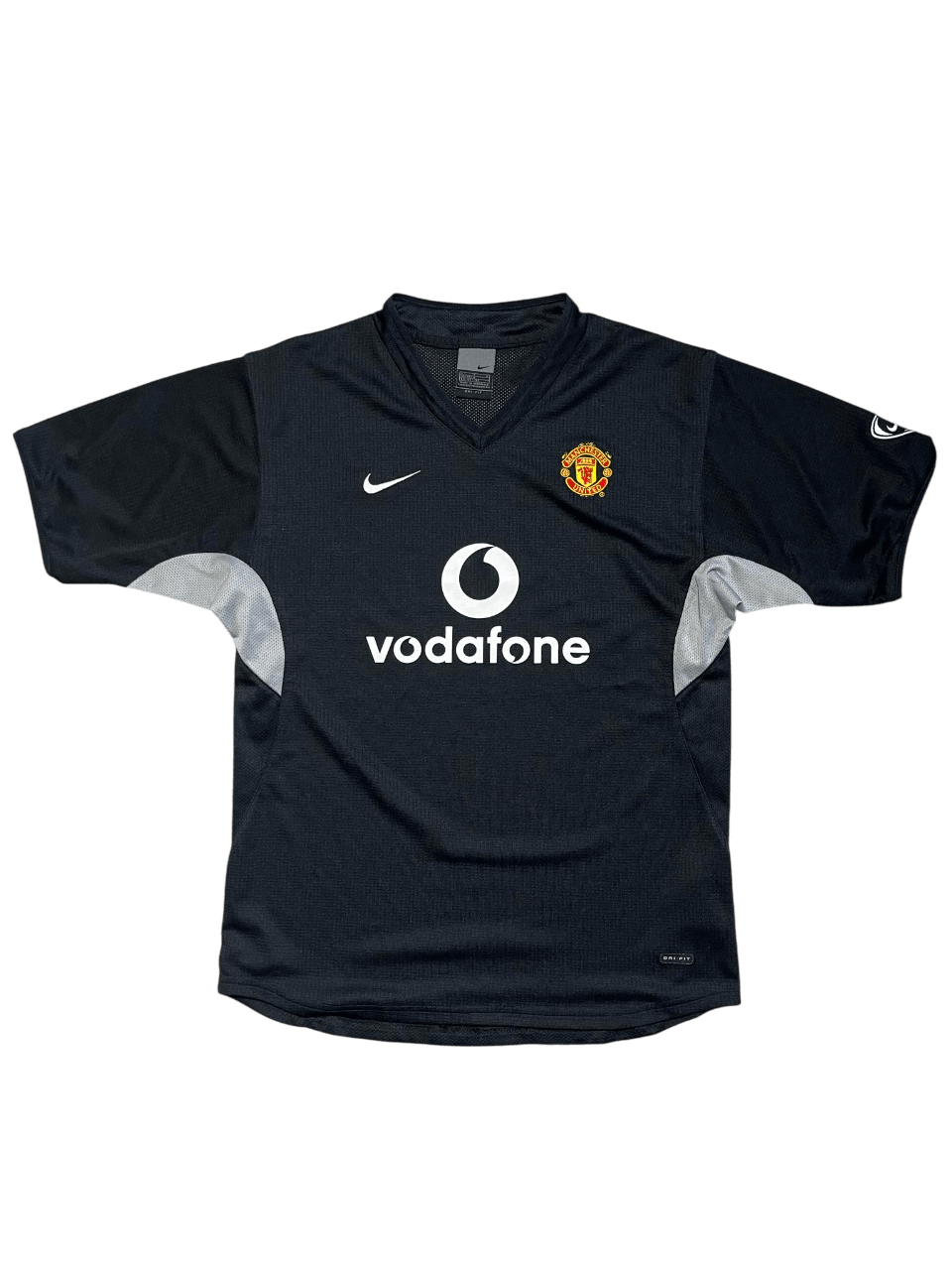 Fekete vintage Nike Manchester United focimez Vodafone logóval, streetwear stílus