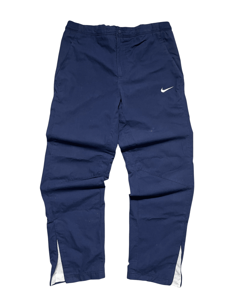 Sötétkék Nike streetwear nadrág fehér logóval és fehér betétekkel az alján, vintage stílus