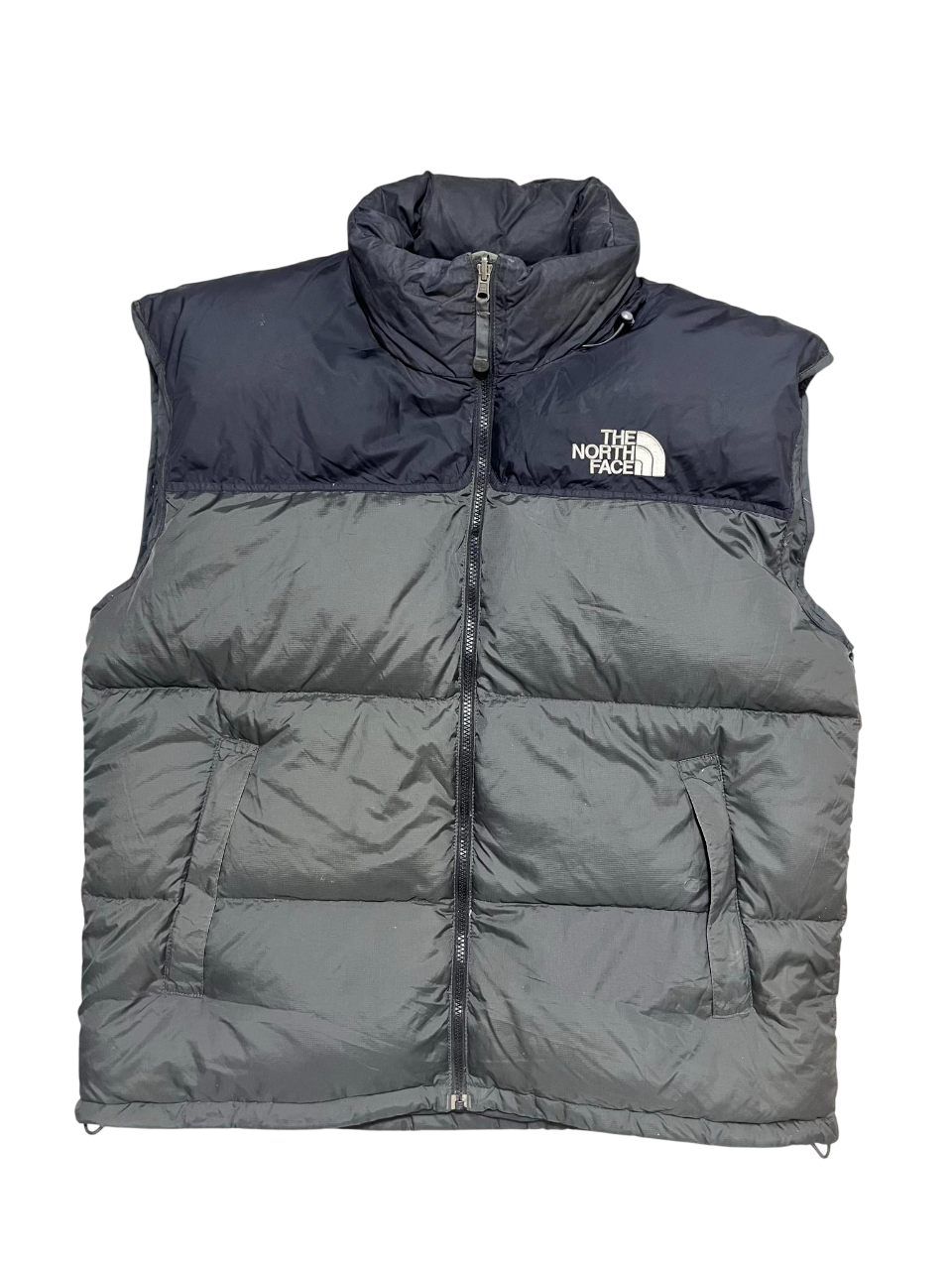 Fekete The North Face pufi mellény, cipzáras, vintage streetwear stílusban